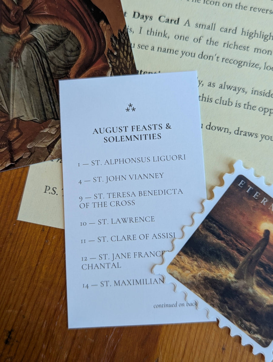 Close-up of scripture and prayer cards from the Pray on Paper Catholic prayer subscription